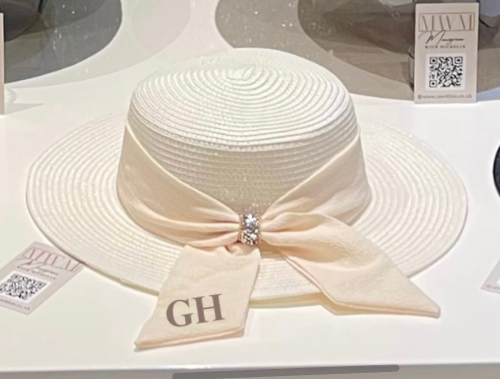 Monogram hat with bow detail at back