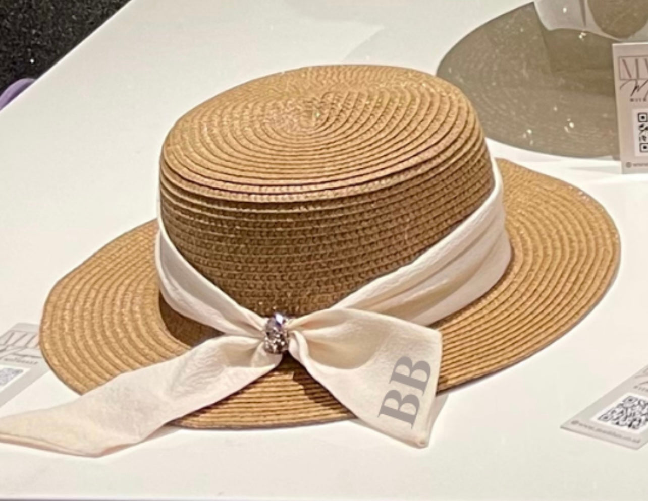 Monogram hat with bow detail at back